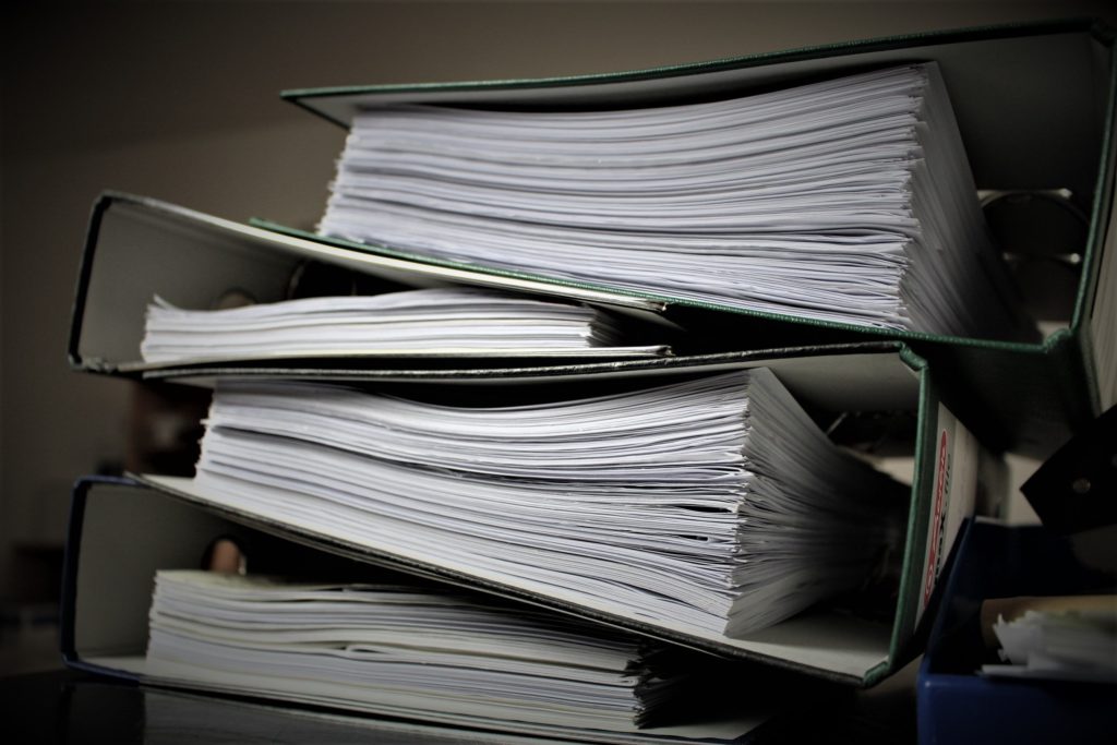 Stacks of case binders from a personal injury law office