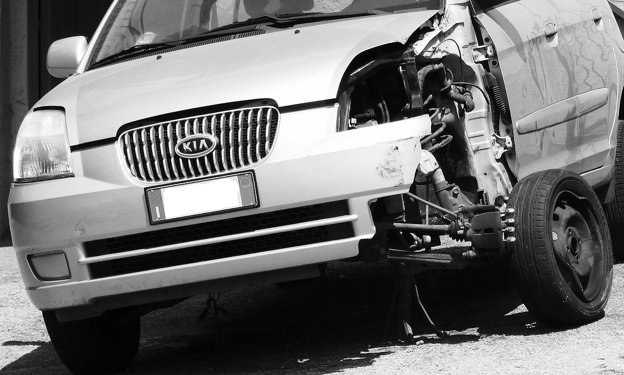A vehicle with a damaged front end after a car accident