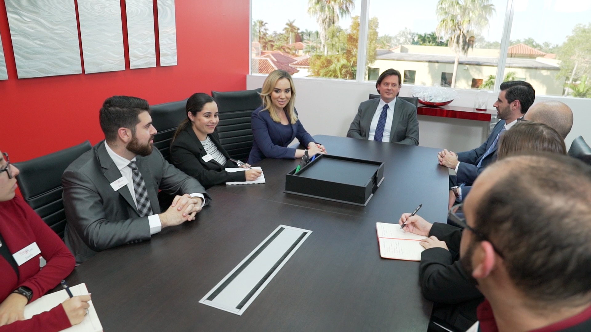 Miami Lakes personal injury lawyers meet at a conference table