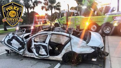 Police photo of vehicle damage from a Davie car accident