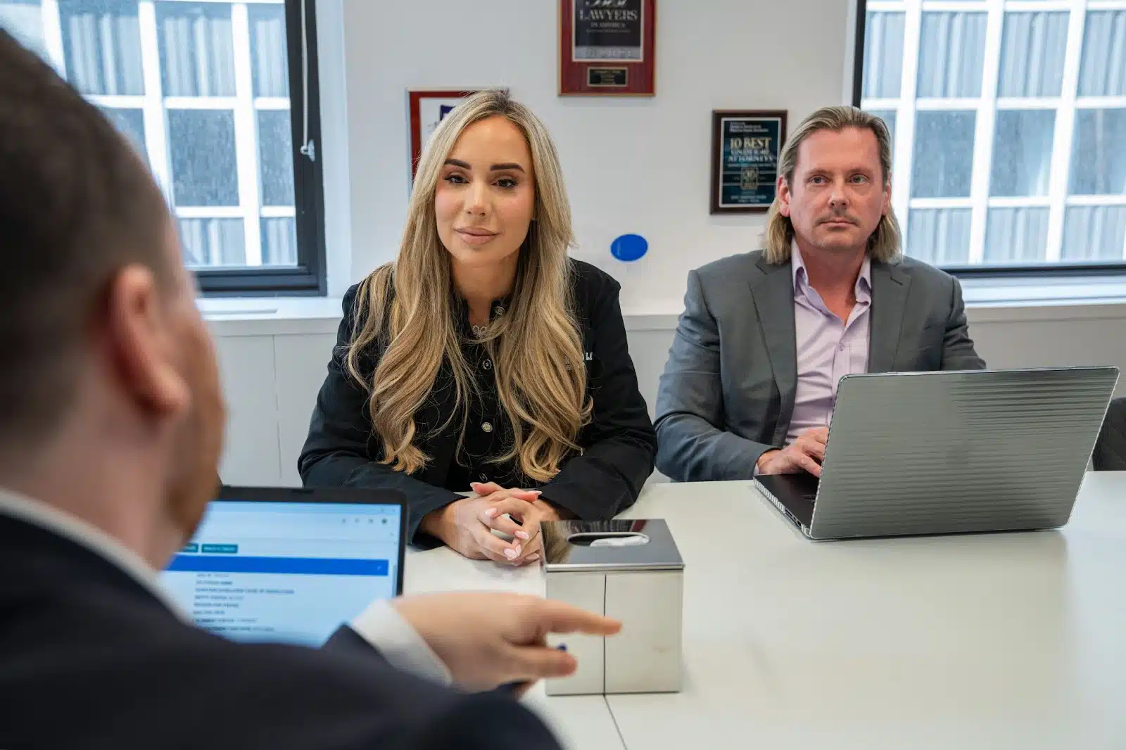 Jany & Greg meeting with client to discuss personal injury law