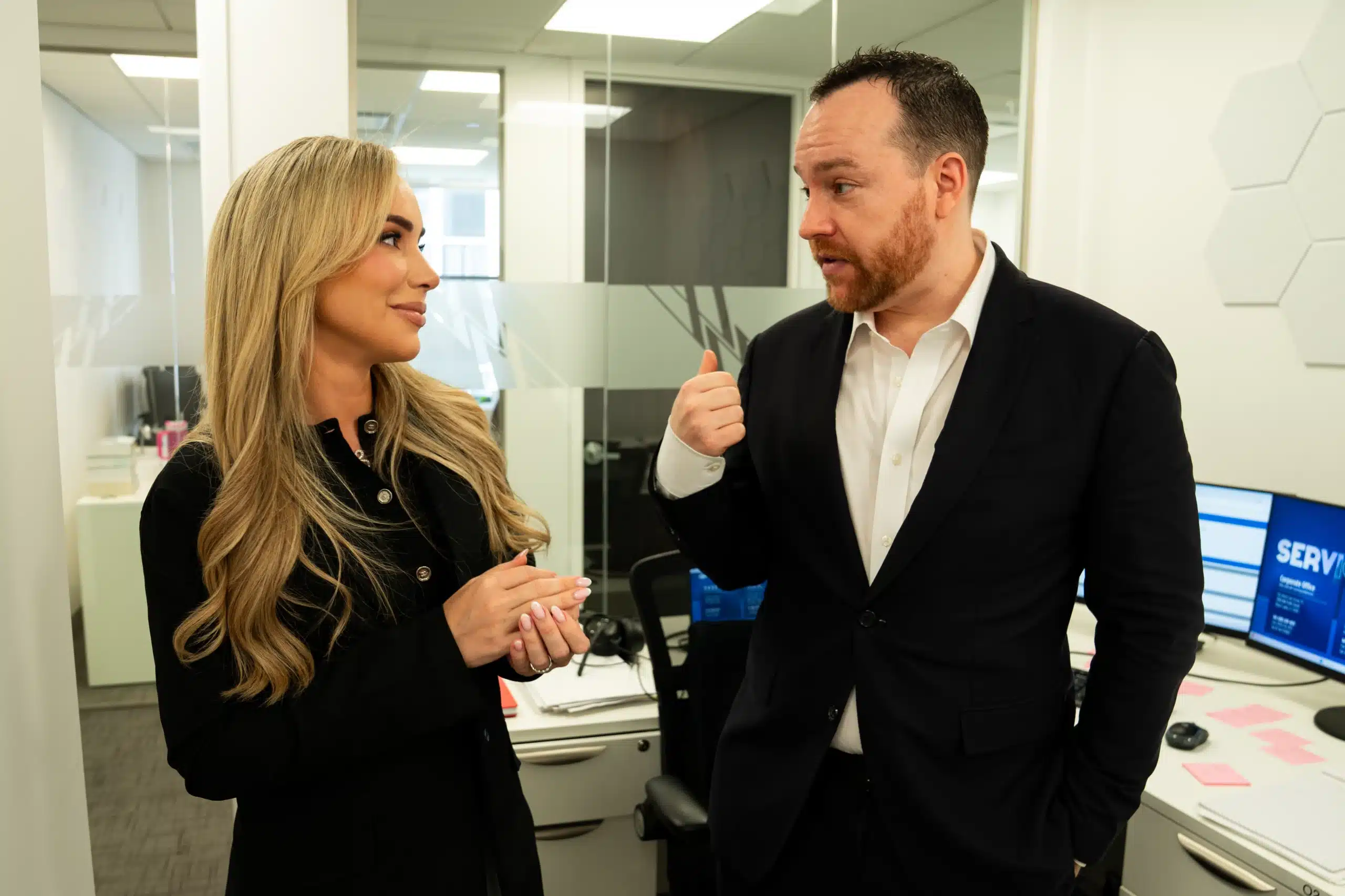 New York car accident attorneys talking in Ward Law’s New York office.