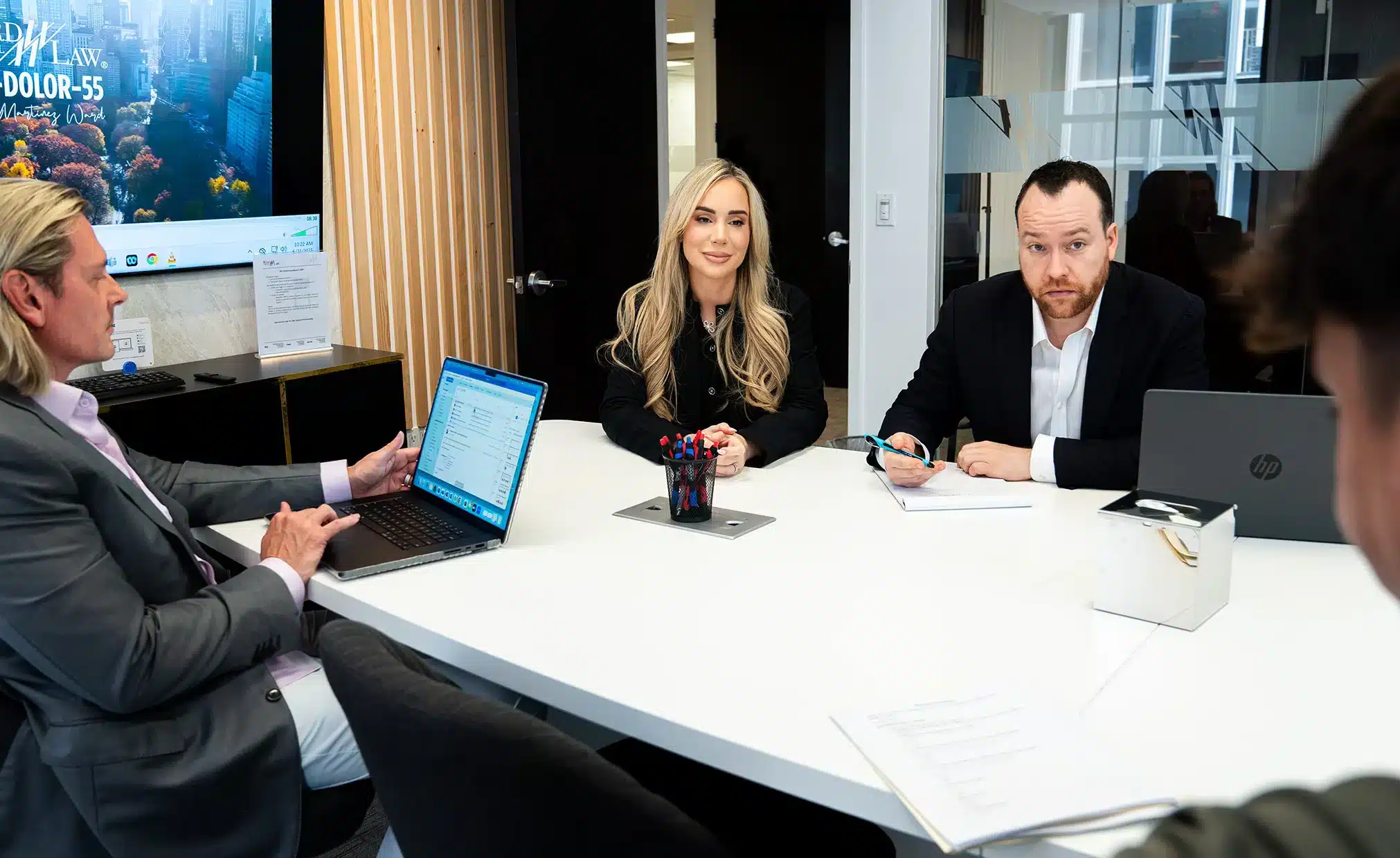 Ward Law attorneys meeting in their New York office to discuss a case